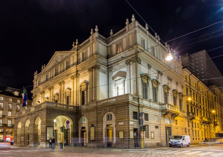 The unmistakable facade of the Teatro alla Scala in Milan by night