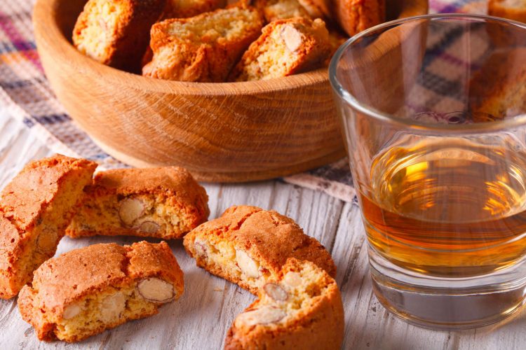 Cantuccini accompanied by a glass of Vin Santo