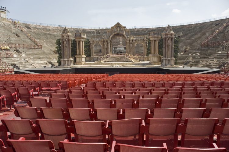 Photo of the interior of the Arena of Verona, set up for concerts.
